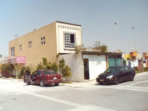 CASA CON AMPLIACION Y LOCAL COMERCIAL