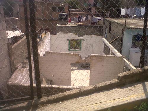 terreno con pie de casa