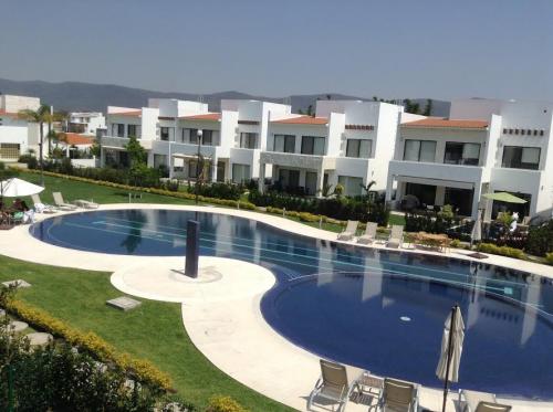 Casa en paraíso country club  en condominio,Alberca común