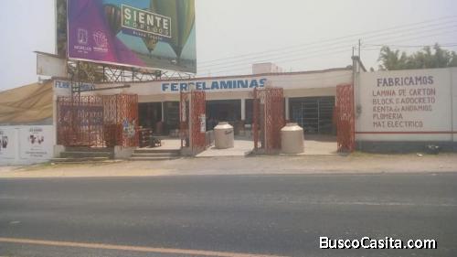 VENTA DE PROPIEDAD CON LOCAL ABORDO DE CARRETERA.